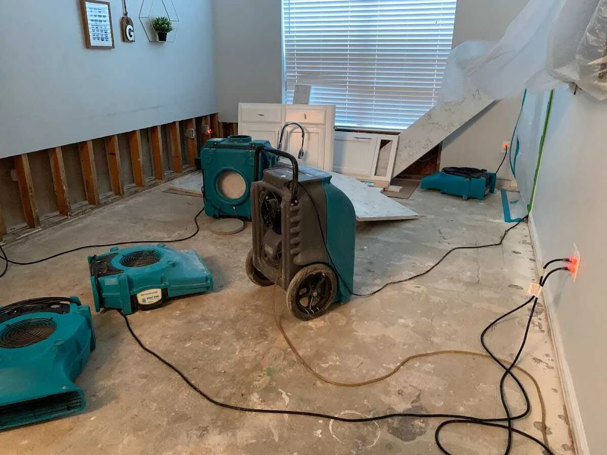 Dehumidifier in flood-cut room for Water Damage Restoration in Orrville